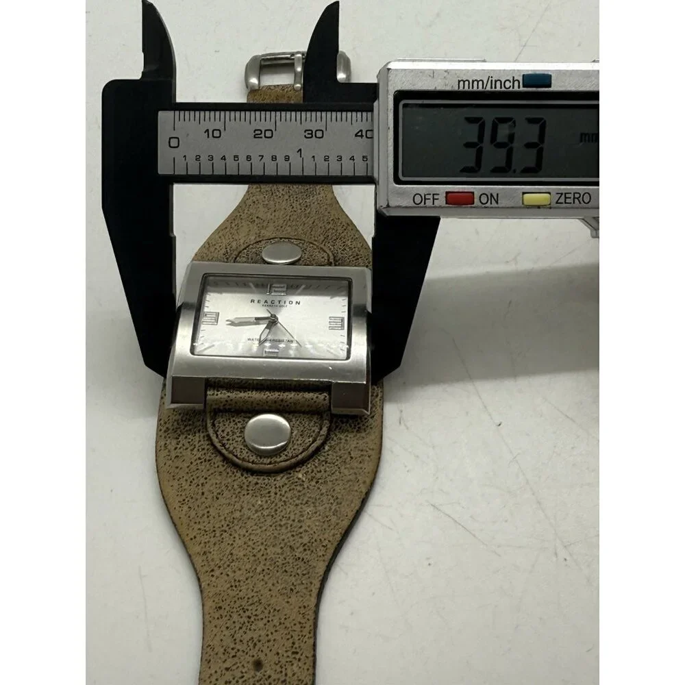 Reaction Kenneth Cole Watch Women's Silver Tone Rectangle Leather Wide Cuff Band